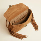 Interior lining and pockets of Brown mini fringe crossbody bag