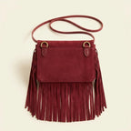 Back panel of Burgundy mini fringe crossbody bag with strap attachments