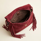 Interior lining and pockets of Burgundy mini fringe crossbody bag