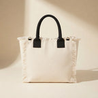 Back panel of Cream oversized beach bag fringe with strap attachments