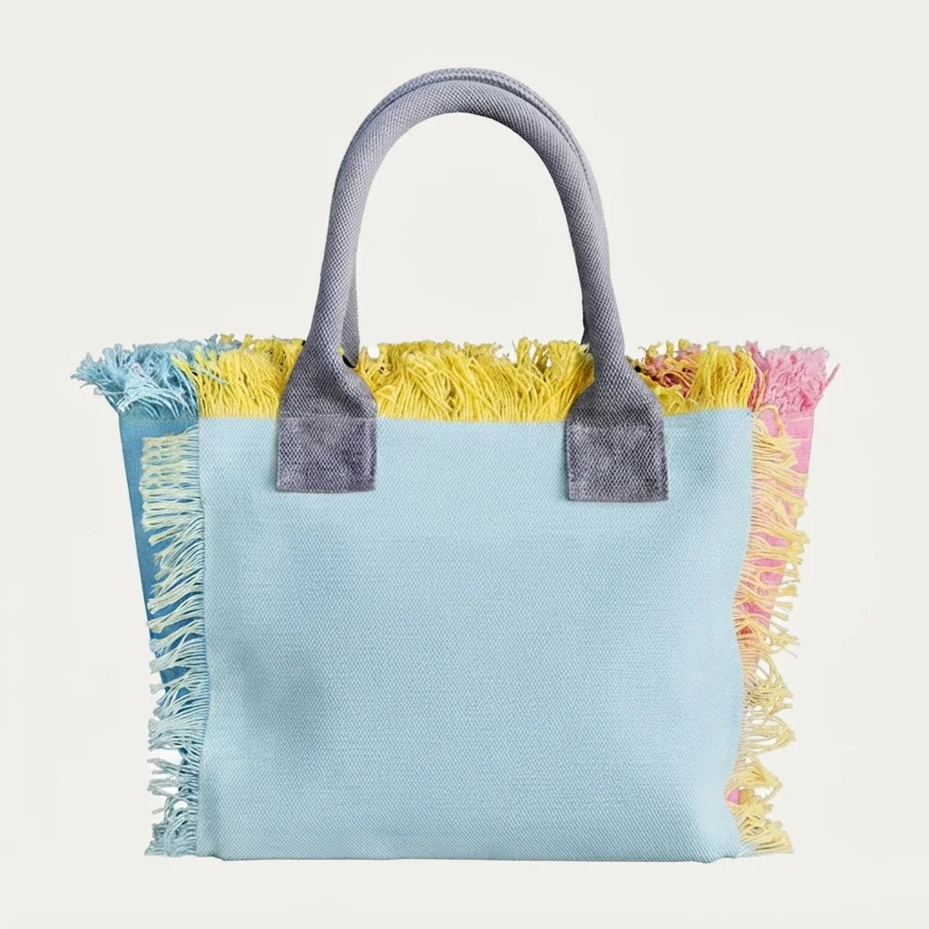 Close-up of fringe stitching and texture on Light Blue oversized beach bag fringe