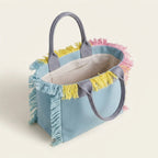 Interior lining and pockets of Light Blue oversized beach bag fringe