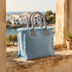 Light Blue beach bag styled in a warm Mediterranean setting