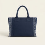 Back panel of Navy oversized beach bag fringe with strap attachments