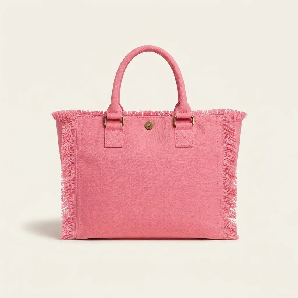 Back panel of Pink oversized beach bag fringe with strap attachments