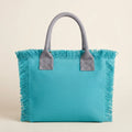 Turquoise oversized beach bag fringe, front view