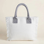 Back panel of White oversized beach bag fringe with strap attachments