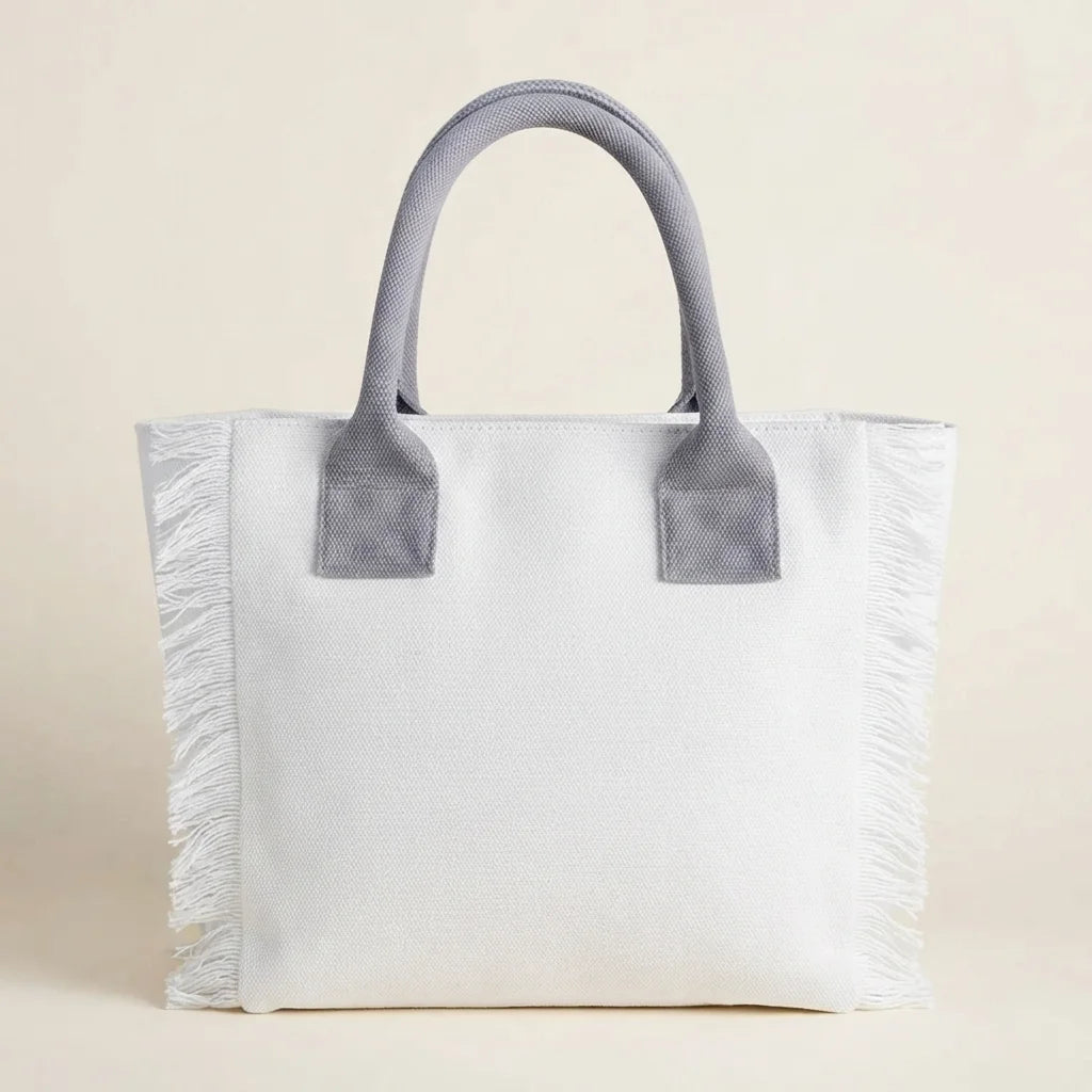 Back panel of White oversized beach bag fringe with strap attachments