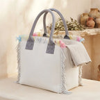 White beach bag, three-quarter angle showing side depth