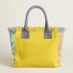 Back panel of Yellow oversized beach bag fringe with strap attachments