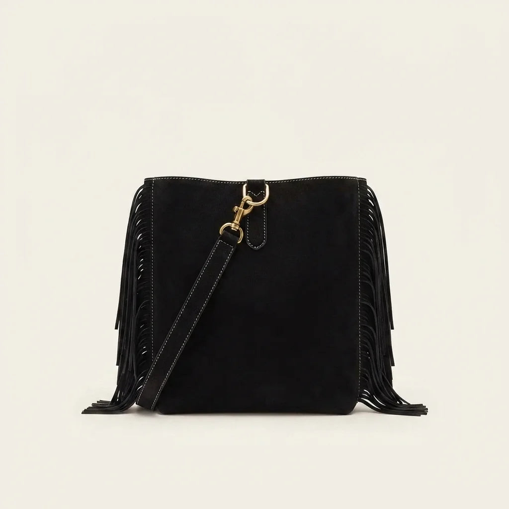Back panel of Black oversized fringe bag with strap attachments