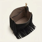 Interior lining and pockets of Black oversized fringe bag