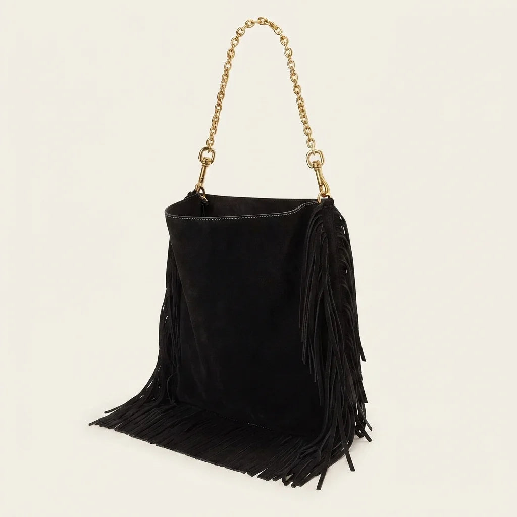 Black oversized fringe bag, three-quarter angle showing side depth