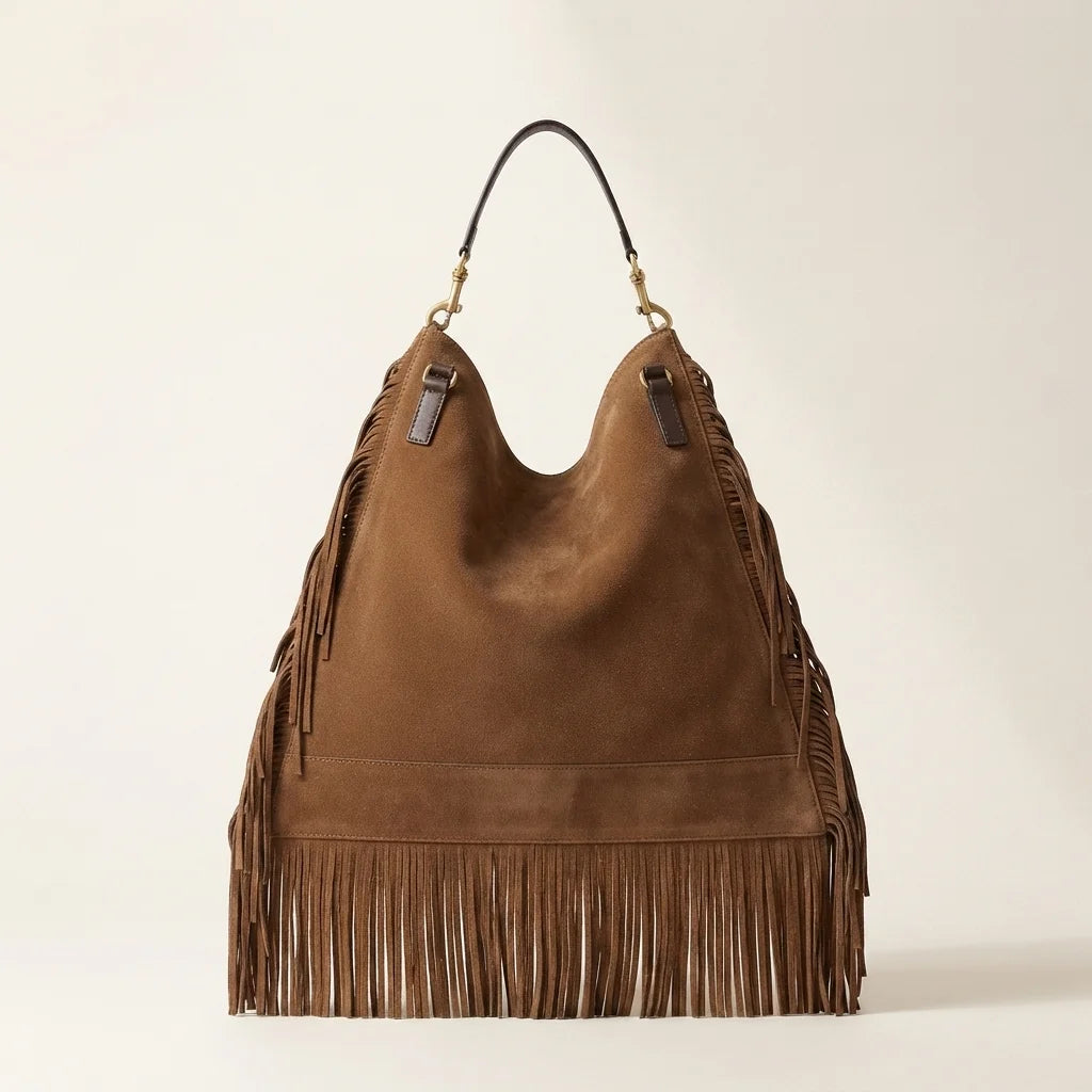 Back panel of Brown oversized fringe bag with strap attachments