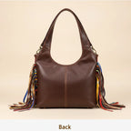 Back panel of Multicolor oversized fringe leather hobo bag with strap attachments