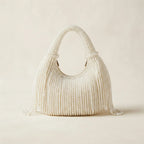Back panel of White pearl fringe bag with strap attachments