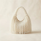 White pearl fringe bag, front view