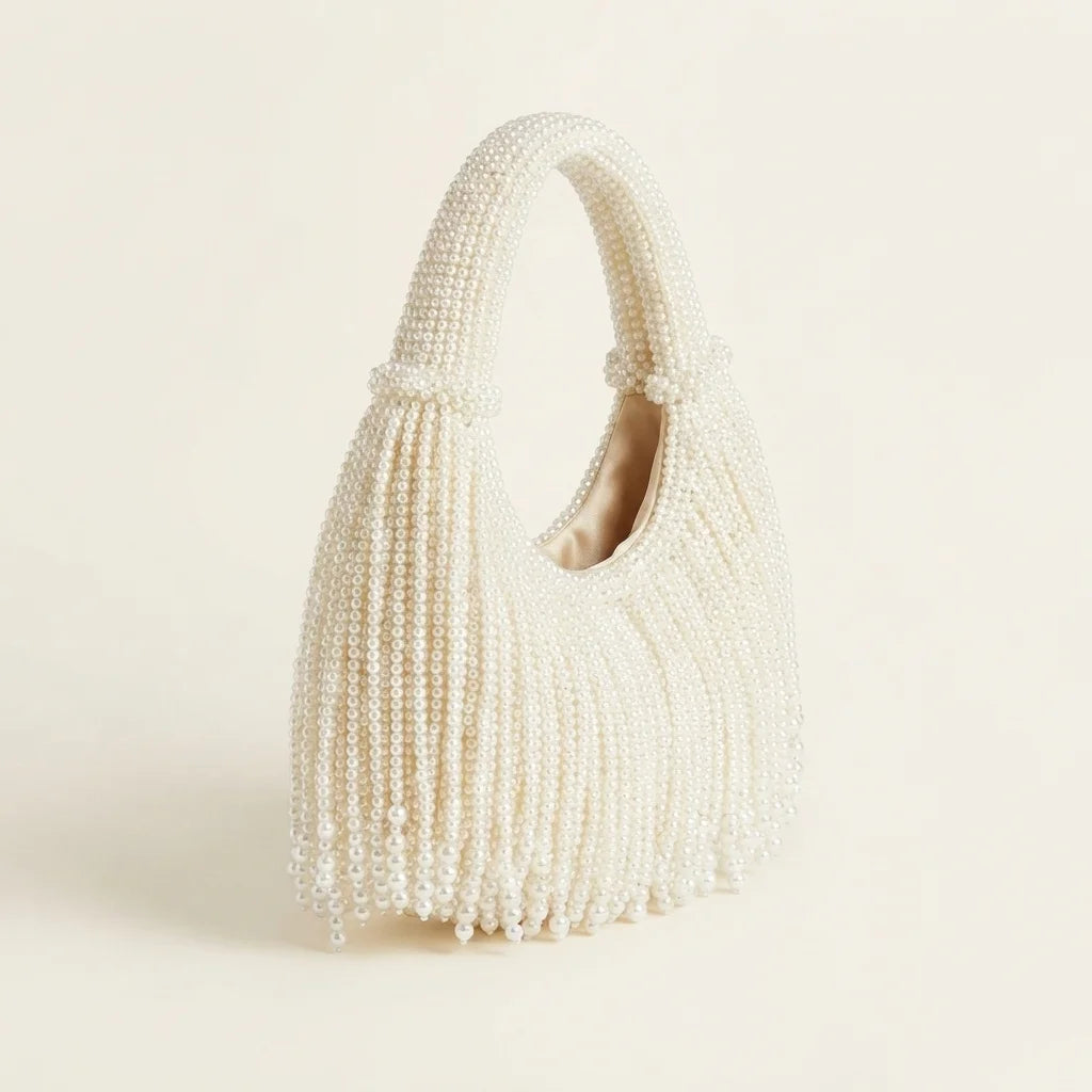 White pearl fringe bag, three-quarter angle showing side depth