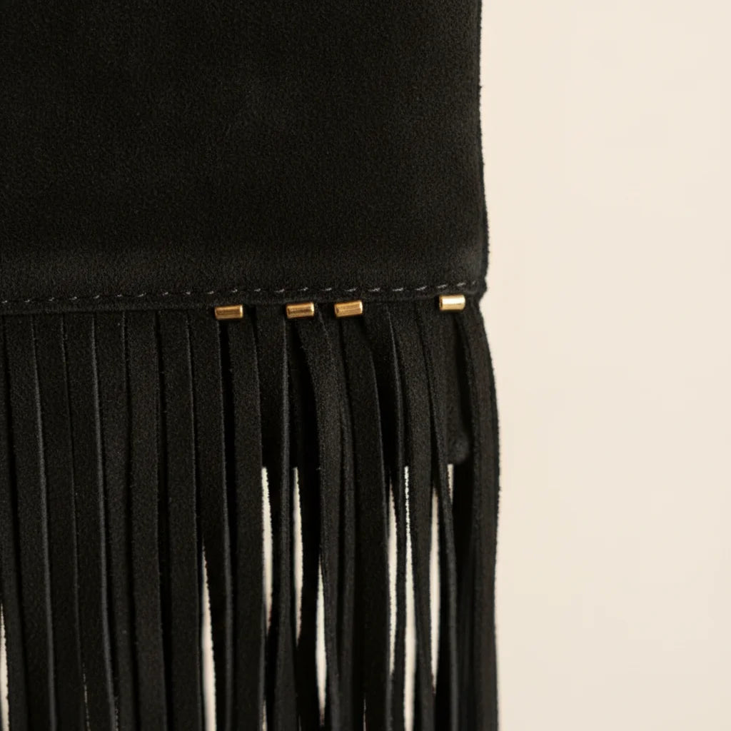 Close-up of fringe stitching and texture on Black pearl fringe clutch bag