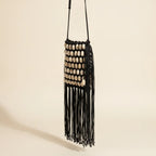 Black pearl fringe clutch bag, three-quarter angle showing side depth