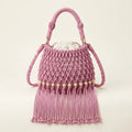 Pink pink bucket bag with fringe, front view