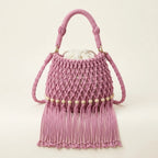 Pink pink bucket bag with fringe, front view