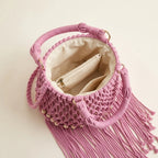 Interior lining and pockets of Pink pink bucket bag with fringe