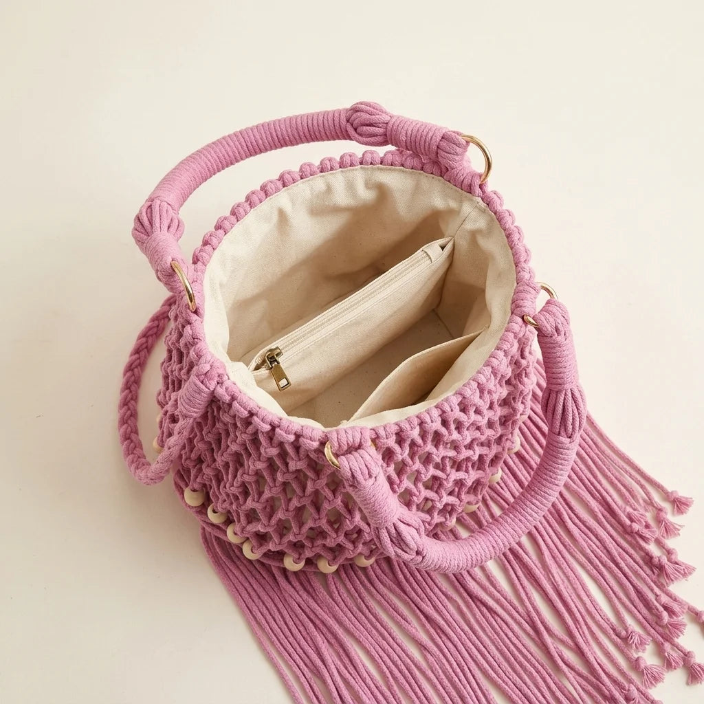 Interior lining and pockets of Pink pink bucket bag with fringe