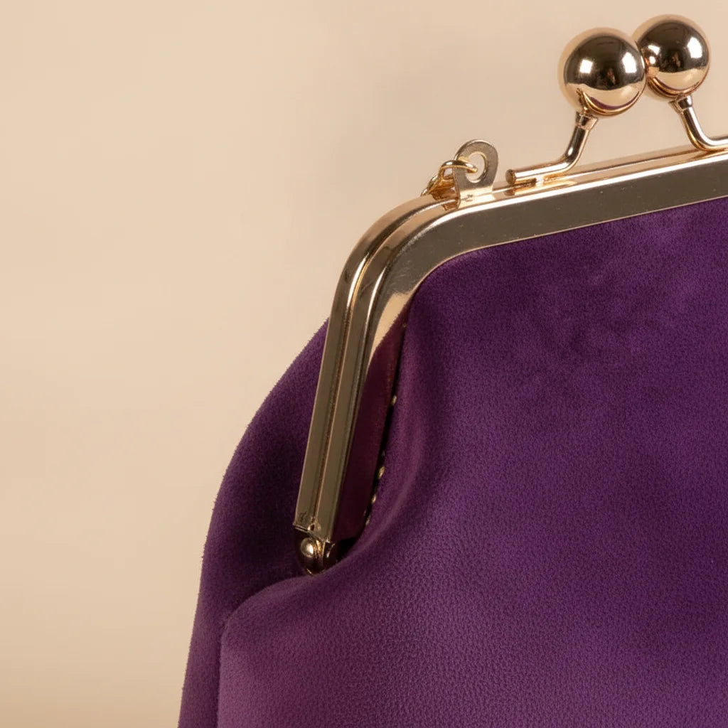 Close-up of fringe stitching and texture on Purple purple fringe clutch bag