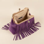 Interior lining and pockets of Purple purple fringe clutch bag