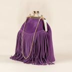Purple purple fringe clutch bag, three-quarter angle showing side depth