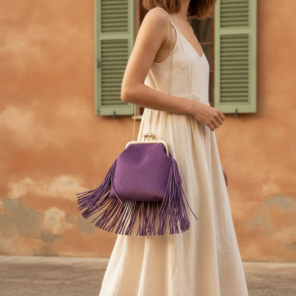 Woman wearing Purple purple fringe clutch bag with swaying fringe