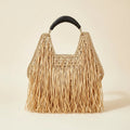 Natural raffia fringe crescent bag, front view