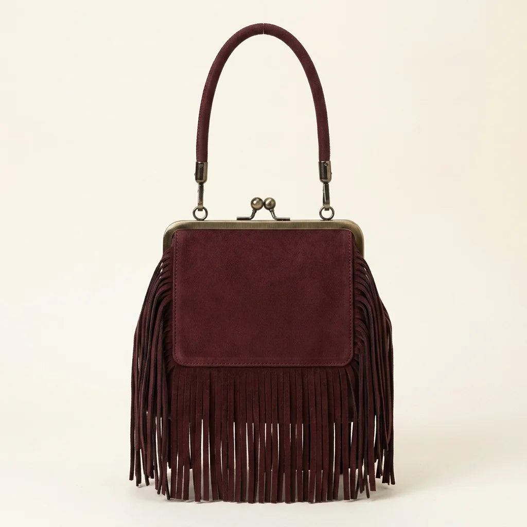 Back panel of Burgundy red fringe clutch bag with strap attachments