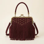 Burgundy red fringe clutch bag, front view