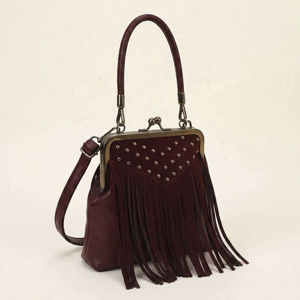 Burgundy red fringe clutch bag, three-quarter angle showing side depth