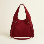 Back panel of Red red fringe crossbody bag with strap attachments