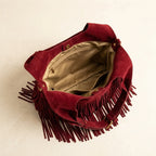 Interior lining and pockets of Red red fringe crossbody bag
