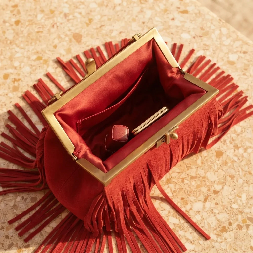 Interior lining and pockets of Red red fringe evening bag