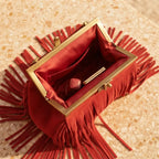 Interior lining and pockets of Red red fringe evening bag