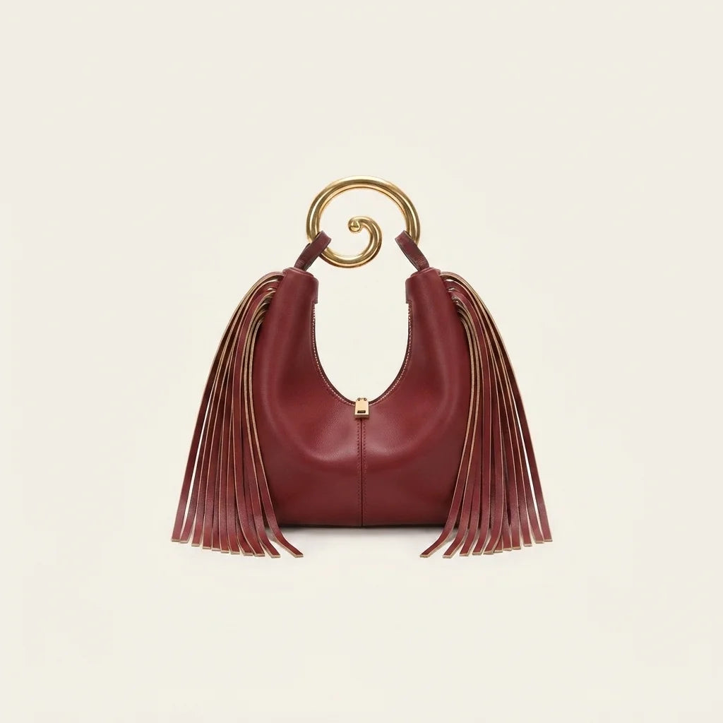 Burgundy red leather fringe hobo bag, front view