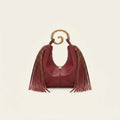 Burgundy red leather fringe hobo bag, front view