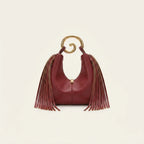 Burgundy red leather fringe hobo bag, front view