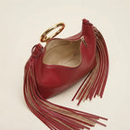 Interior lining and pockets of Burgundy red leather fringe hobo bag