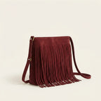 Red red suede fringe bag, three-quarter angle showing side depth