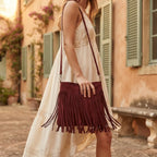 Woman wearing Red red suede fringe bag with swaying fringe