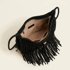 Interior lining and pockets of Black side fringe hobo bag