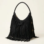 Black side fringe hobo bag, three-quarter angle showing side depth