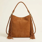 Back panel of Brown side fringe hobo bag with strap attachments