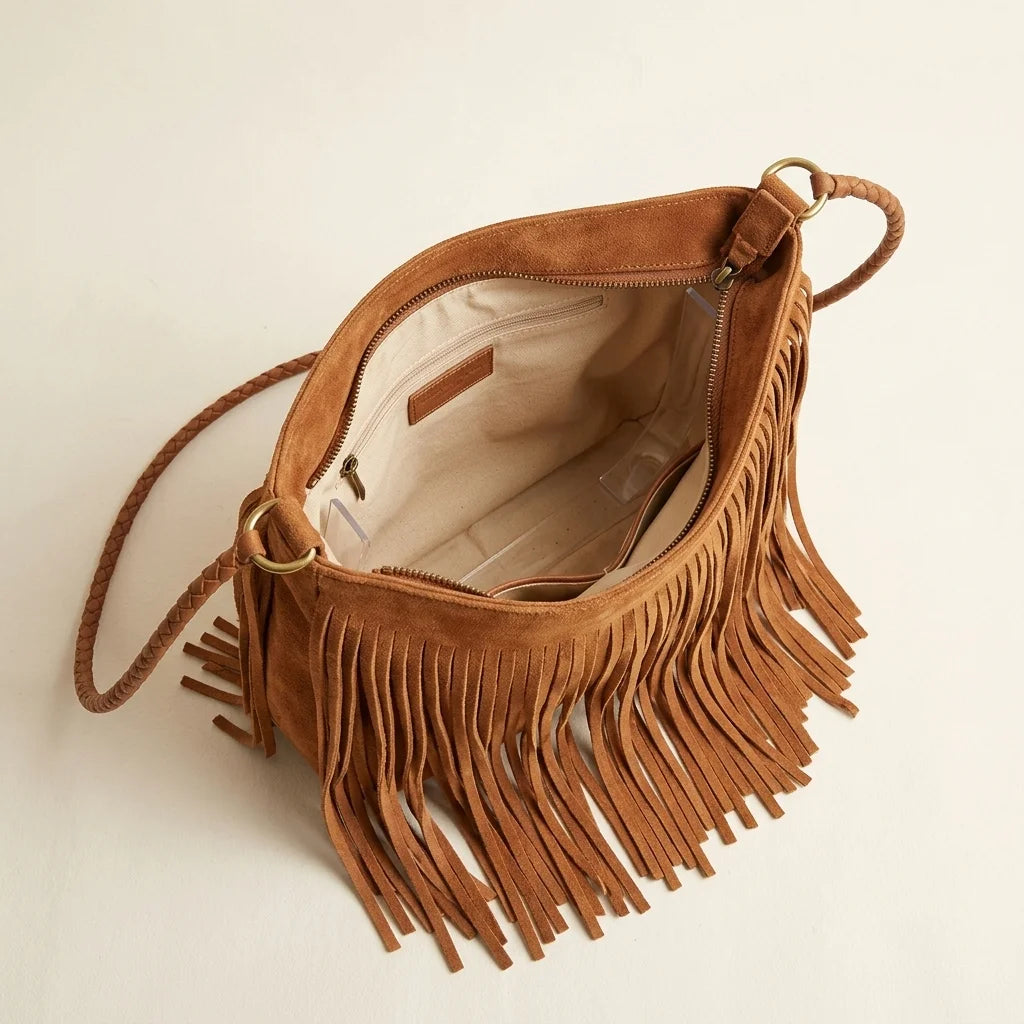 Interior lining and pockets of Brown side fringe hobo bag